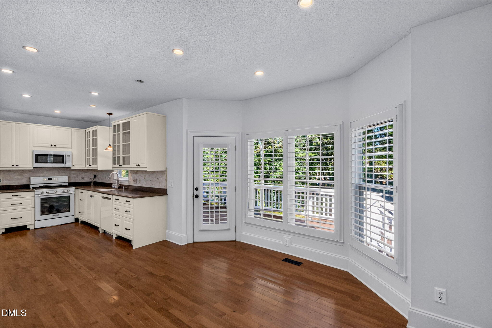 5428 Ingate Way Raleigh, NC 27613 - Photo 13 of 24 Kitchen and family/great room