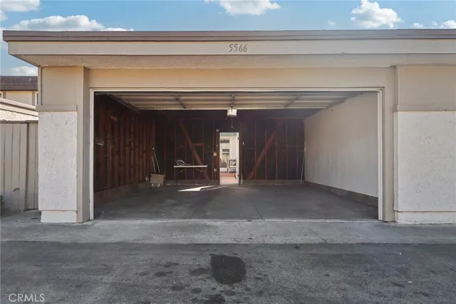 a view of a living room with a fireplace