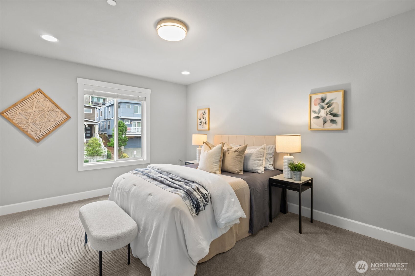 18231 3rd Drive Southeast Bothell, WA 98012 - Photo 22 of 40 a bedroom with a bed and a chair