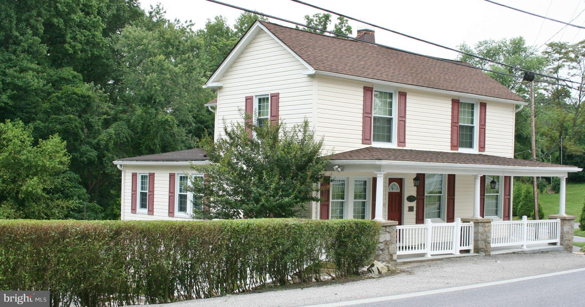 front view of a house and a yard