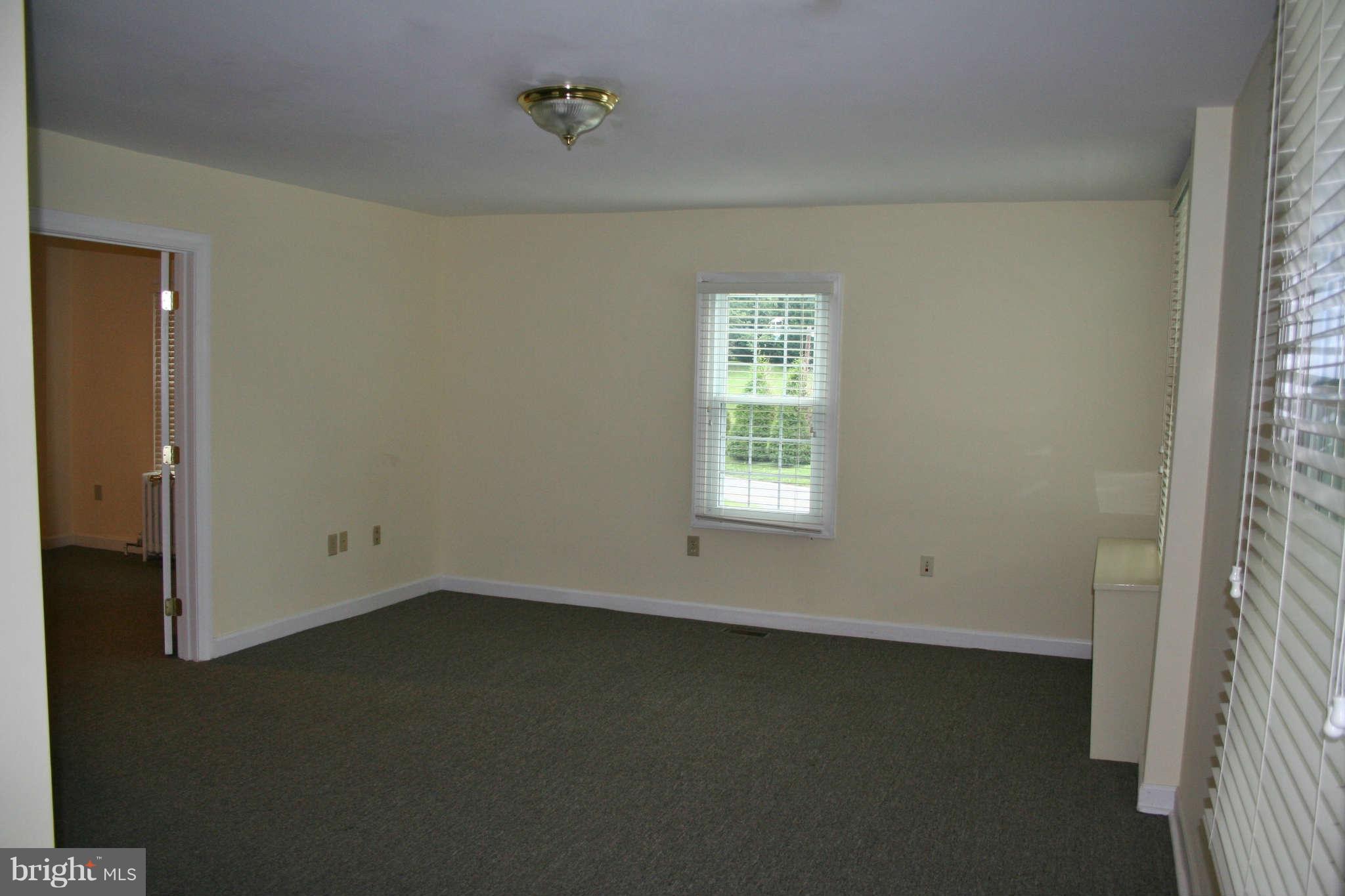 10529 Old Court Road Woodstock, MD 21163 - Photo 9 of 26 an empty room with a window