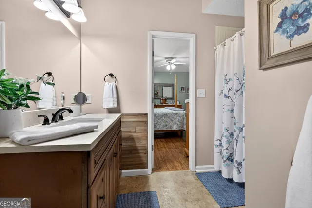 a front view of a house with a yard table and chairs