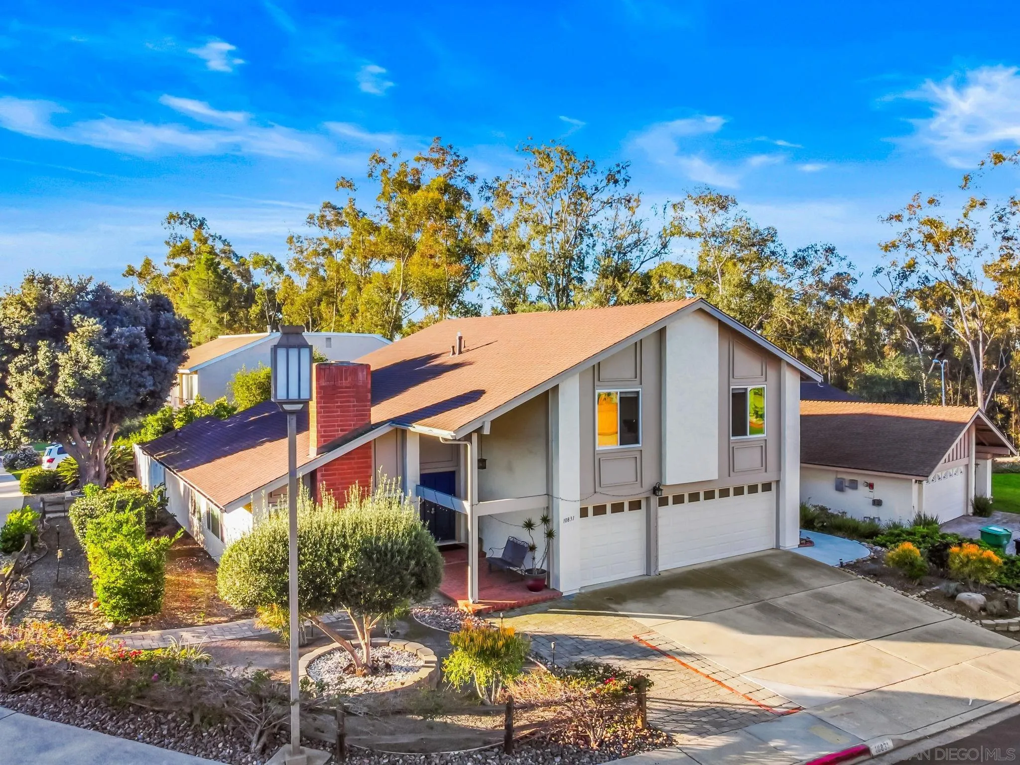 10831 Ironwood Road Scripps Ranch, CA 92131 - Photo 2 of 25 a view of a house with a backyard