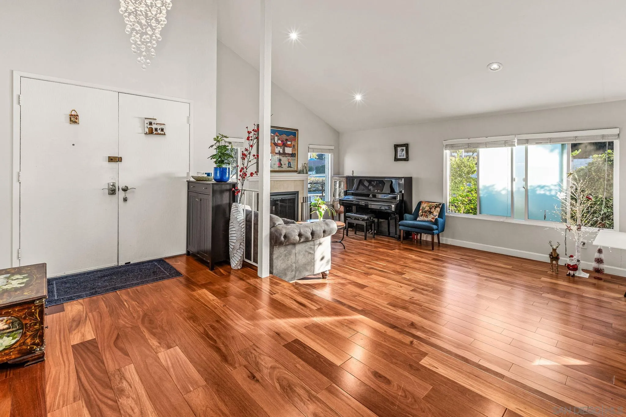 10831 Ironwood Road Scripps Ranch, CA 92131 - Photo 4 of 25 a living room with furniture and large windows