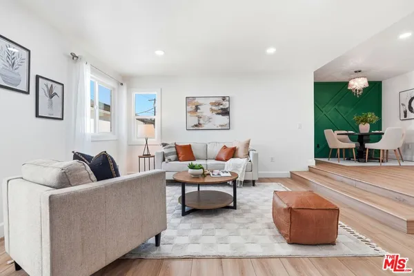a living room with furniture and a couch