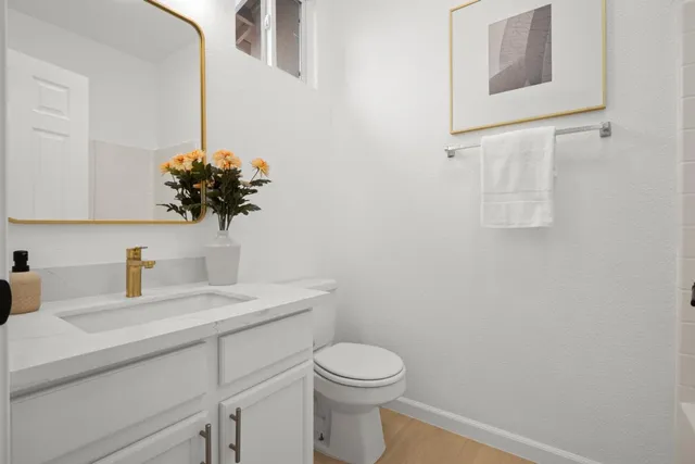 a bathroom with a sink and a toilet