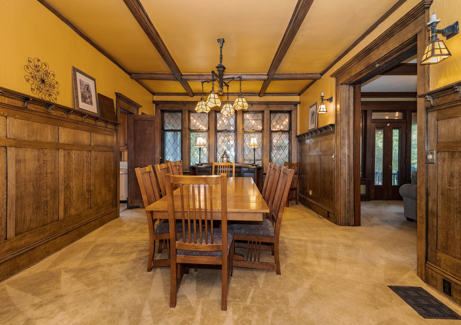 1111 East Grove Street Bloomington, IL 61701 - Photo 21 of 56 a view of a dining room with furniture and chandelier
