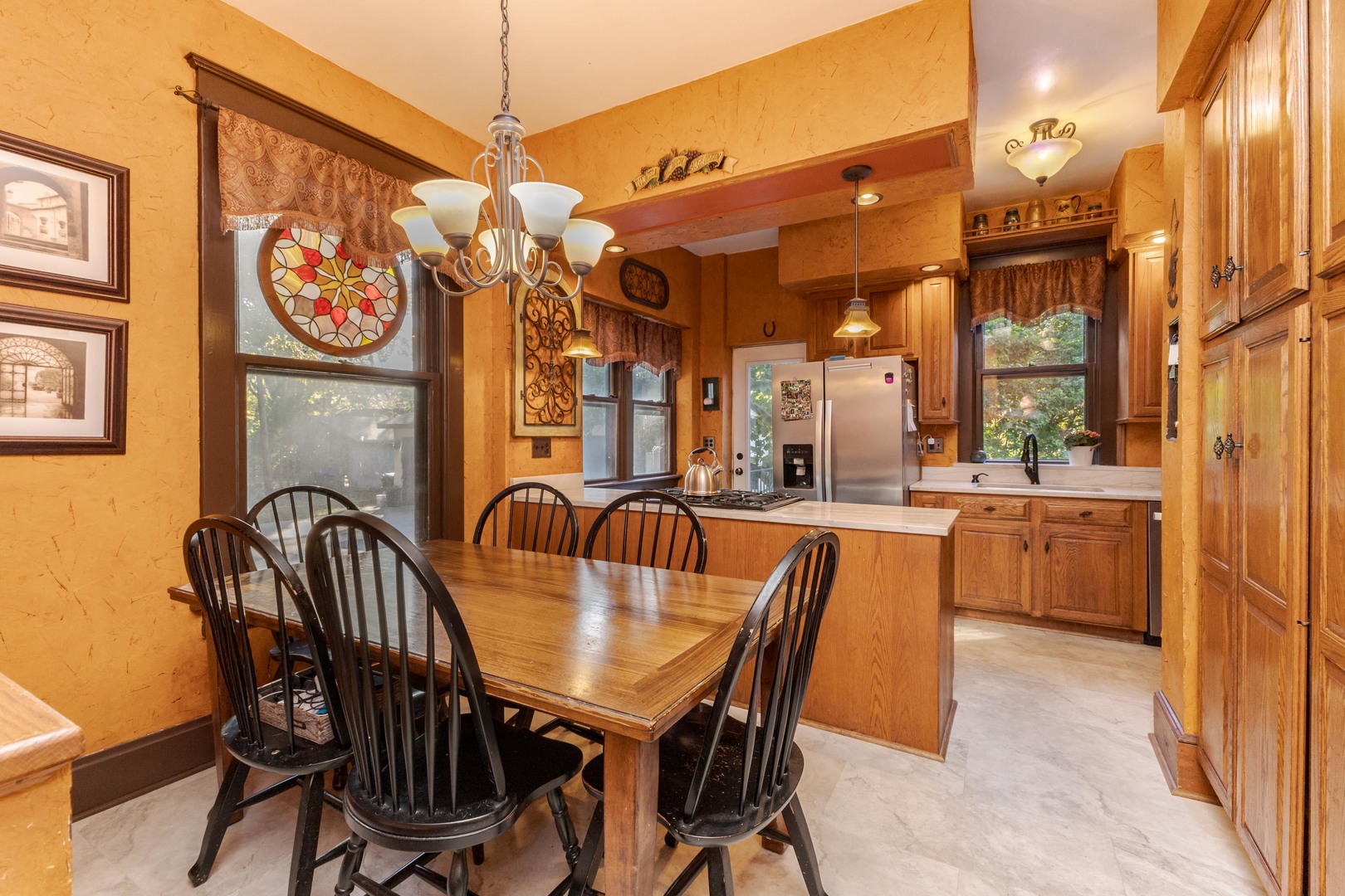 1111 East Grove Street Bloomington, IL 61701 - Photo 25 of 56 a dining area with furniture and a large window