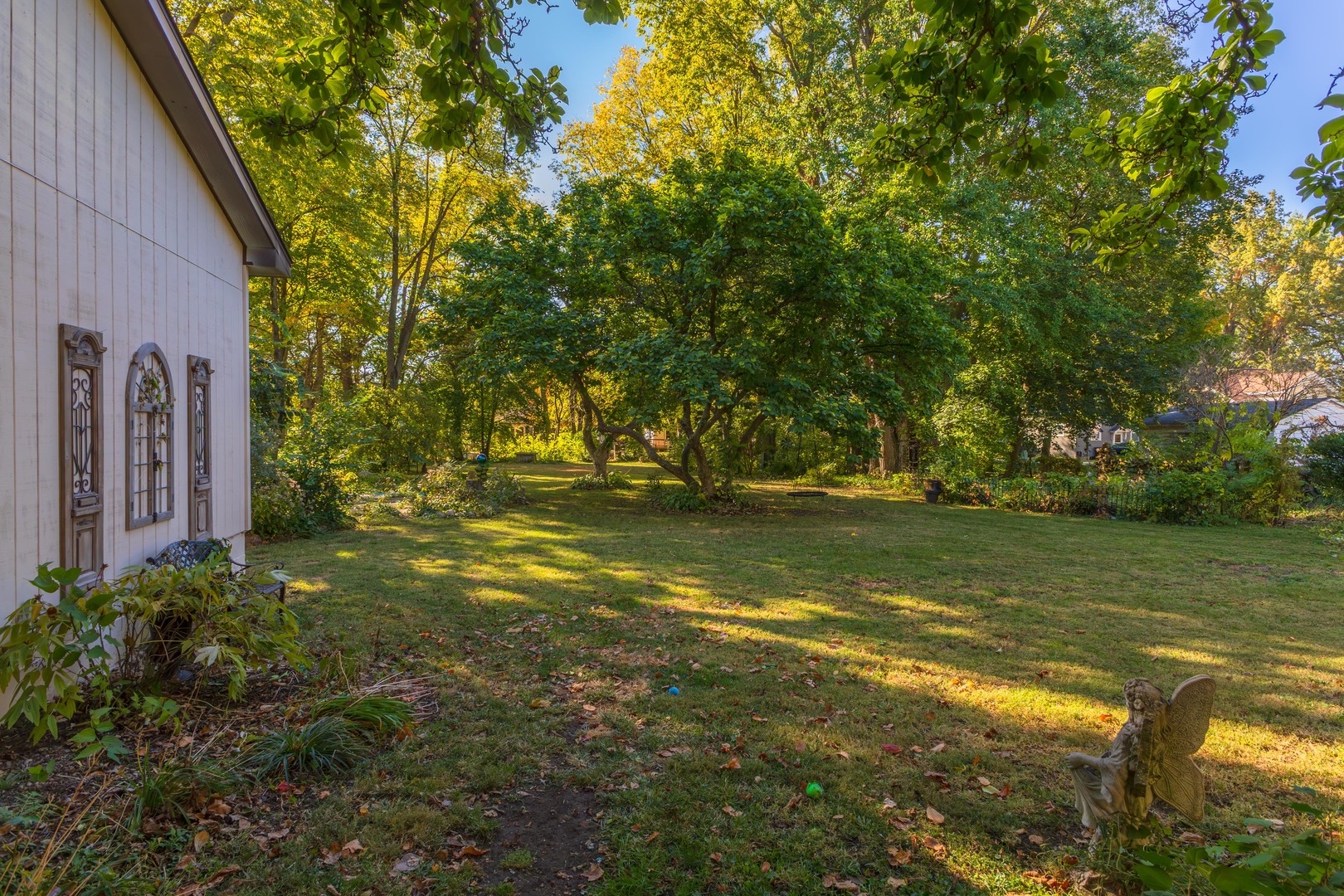 1111 East Grove Street Bloomington, IL 61701 - Photo 49 of 56 a view of outdoor space with trees