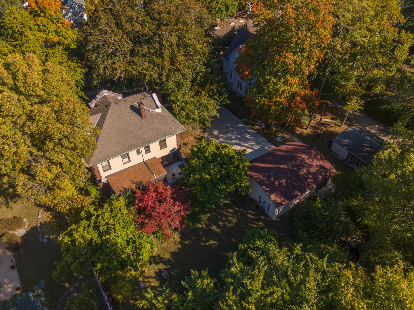 1111 East Grove Street Bloomington, IL 61701 - Photo 56 of 56 an aerial view of a house with a yard and garden