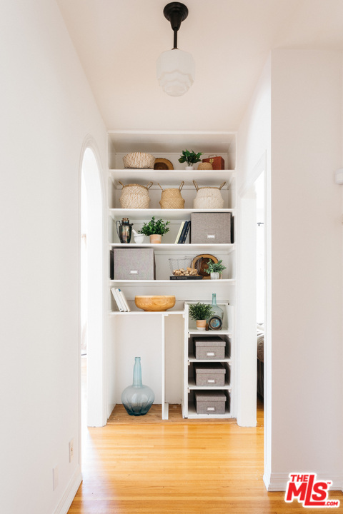 6151 Barrows Drive Los Angeles, CA 90048 - Photo 21 of 25 a view of storage and utility room with empty racks