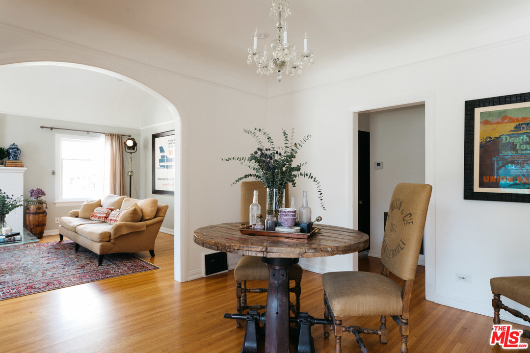 6151 Barrows Drive Los Angeles, CA 90048 - Photo 6 of 25 a living room with furniture and wooden floor