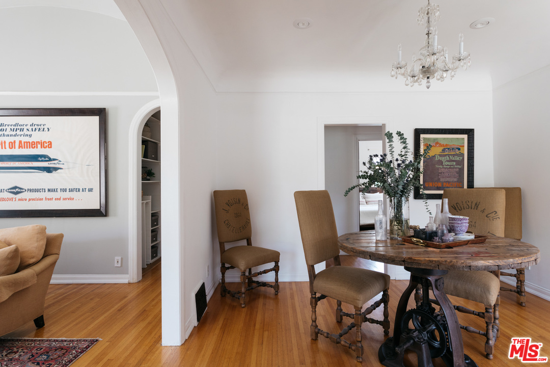 6151 Barrows Drive Los Angeles, CA 90048 - Photo 7 of 25 a dining room with furniture and wooden floor