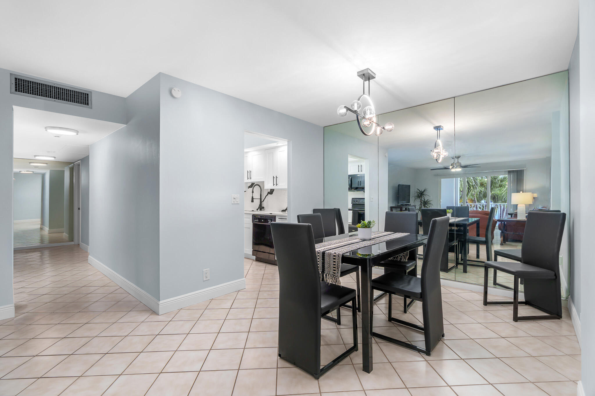 950 Ponce De Leon Road, Unit 207 Boca Raton, FL 33432 - Photo 14 of 36 a view of a dining room with furniture