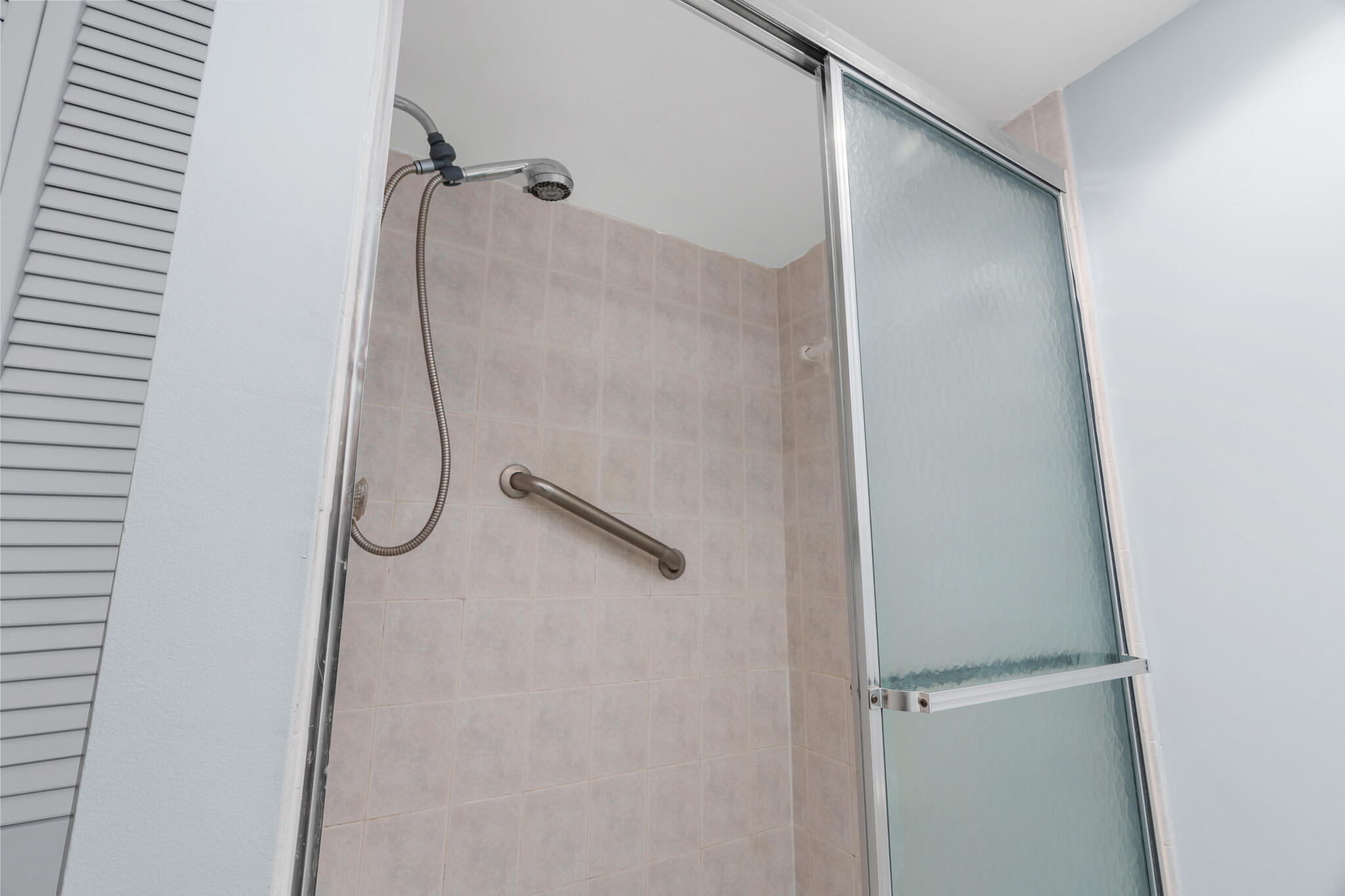 950 Ponce De Leon Road, Unit 207 Boca Raton, FL 33432 - Photo 20 of 36 a bathroom with a shower