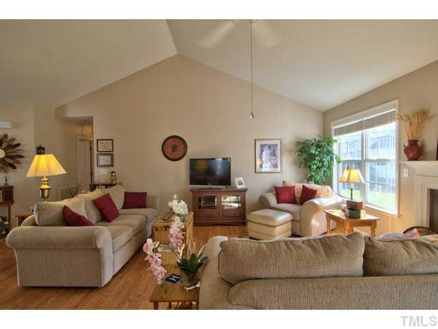 6 Bethany Place Durham, NC 27712 - Photo 2 of 12 a living room with furniture and a flat screen tv