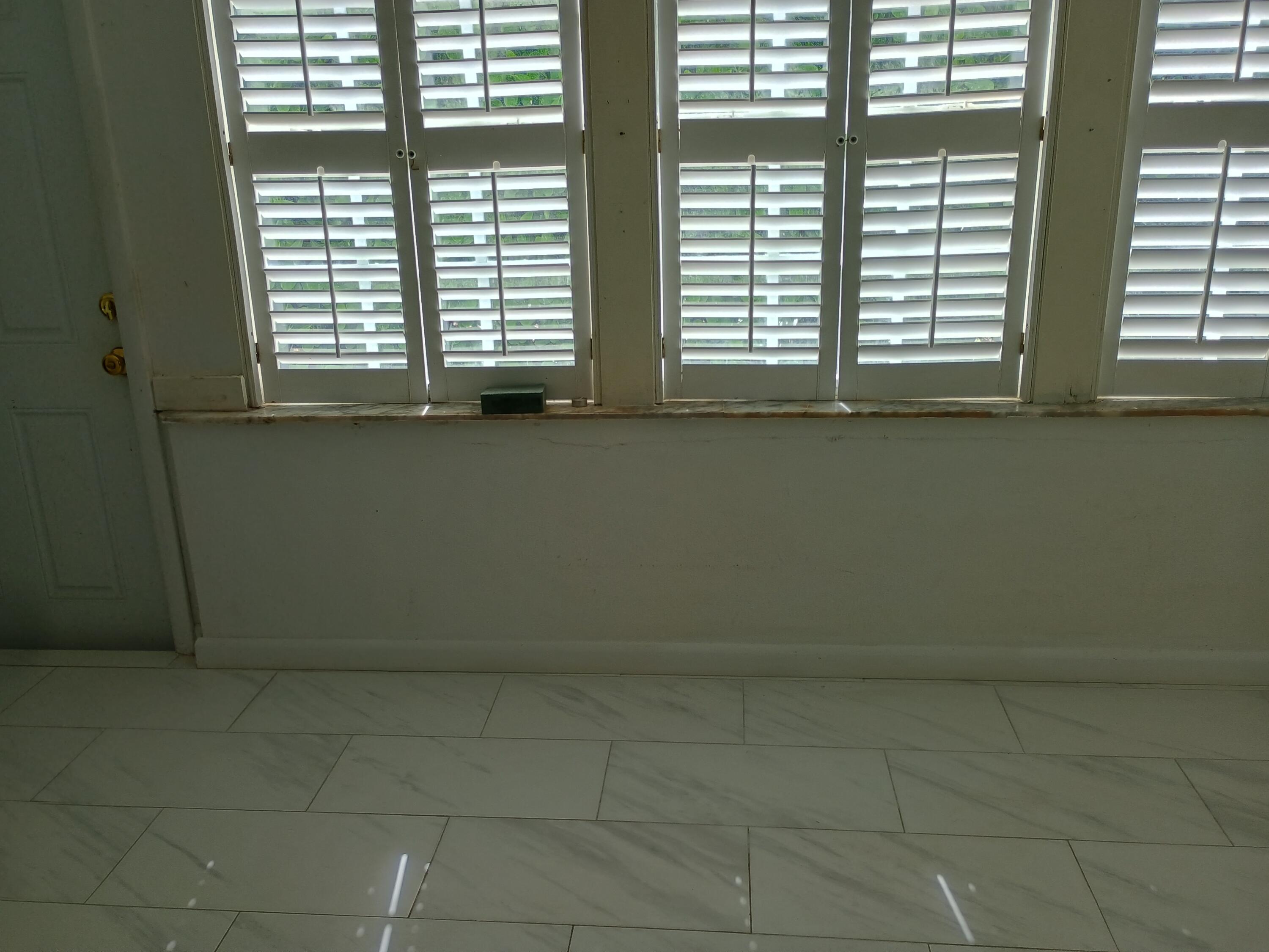 5505 North Ocean Boulevard, Unit 8110 Ocean Ridge, FL 33435 - Photo 14 of 18 a view of an empty room with a window