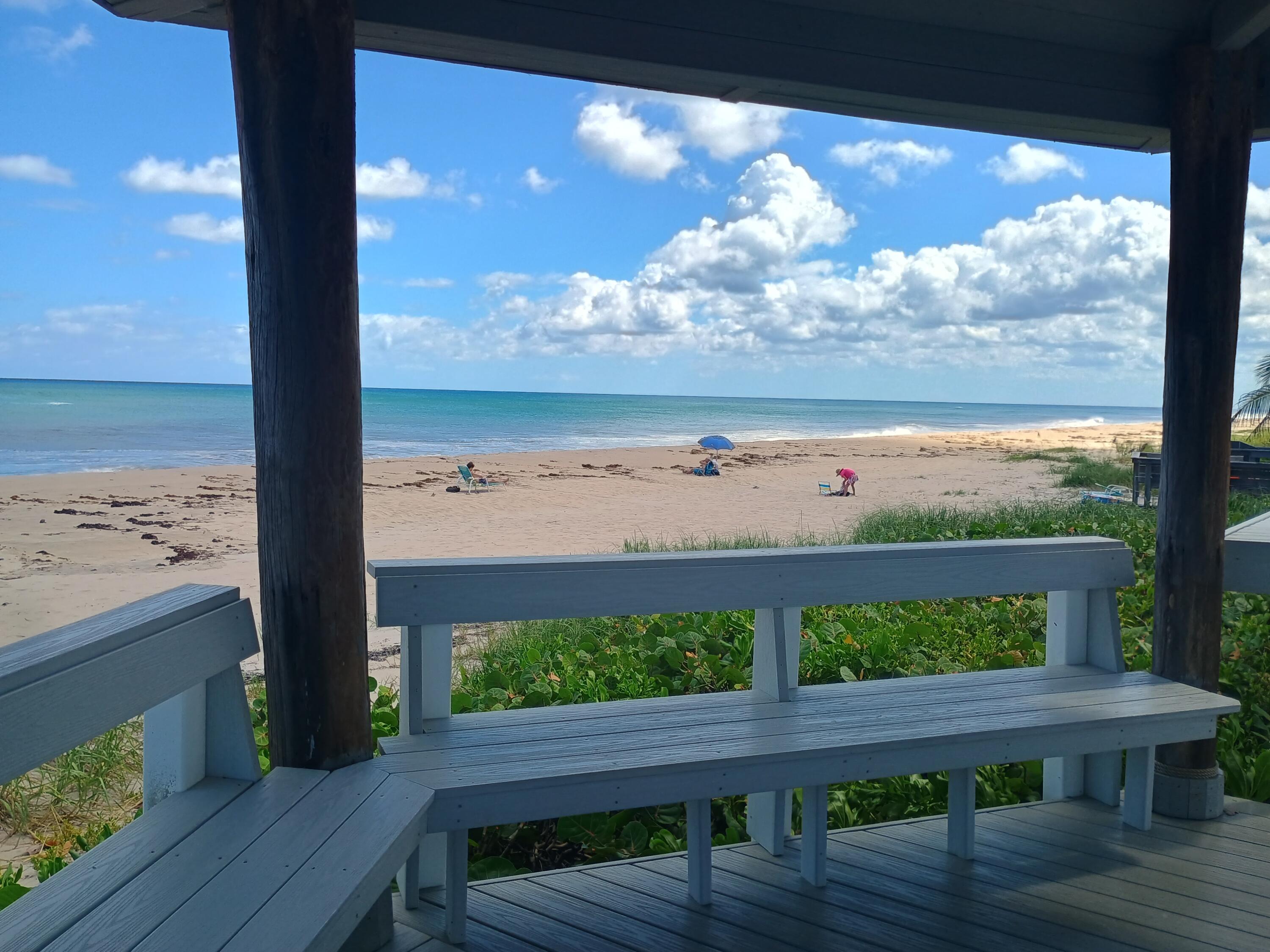5505 North Ocean Boulevard, Unit 8110 Ocean Ridge, FL 33435 - Photo 2 of 18 a view of a porch with wooden floor