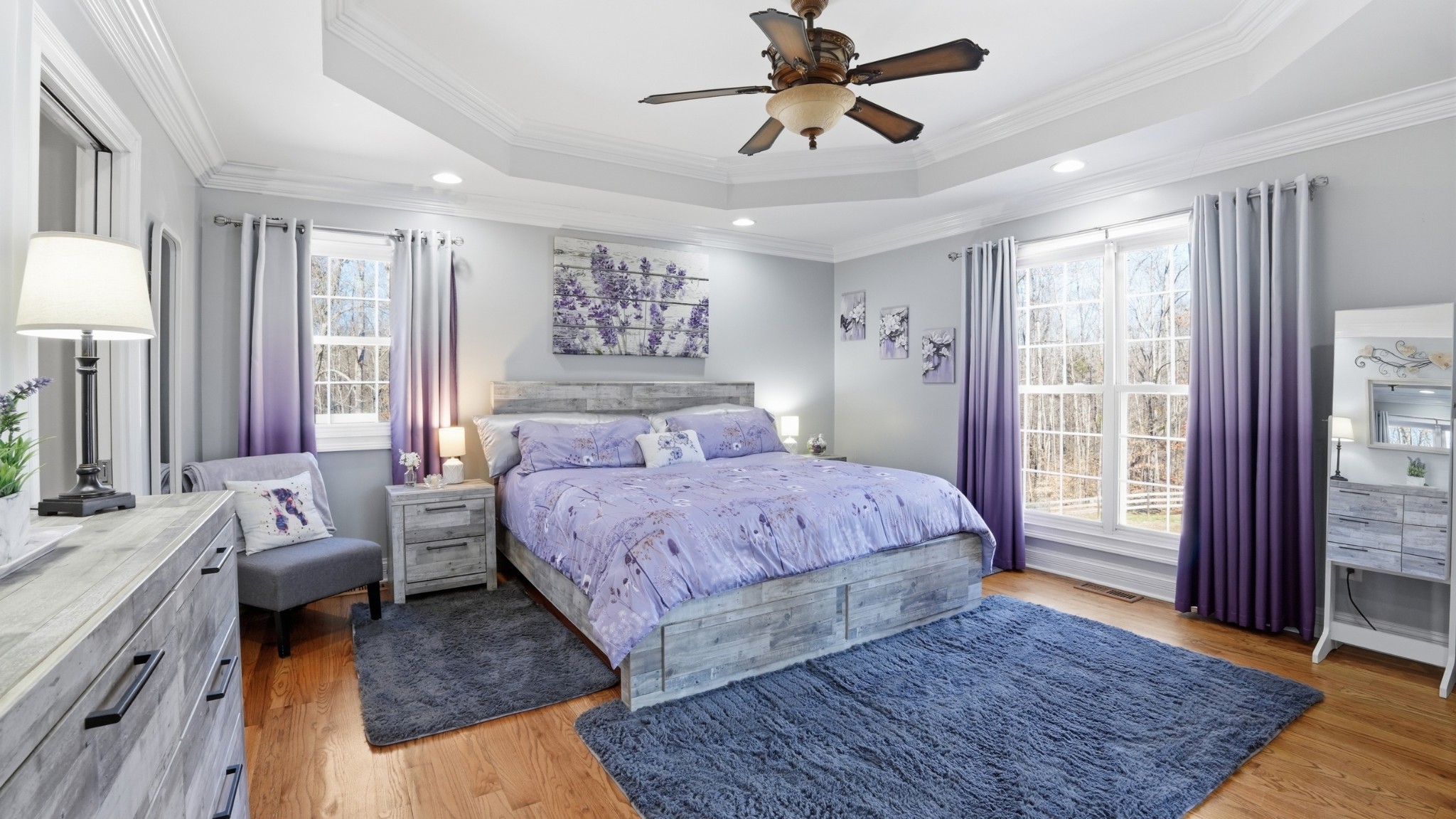 135 Vols Lane Estill Springs, TN 37330 - Photo 15 of 56 a bed room with a bed a couch and a window