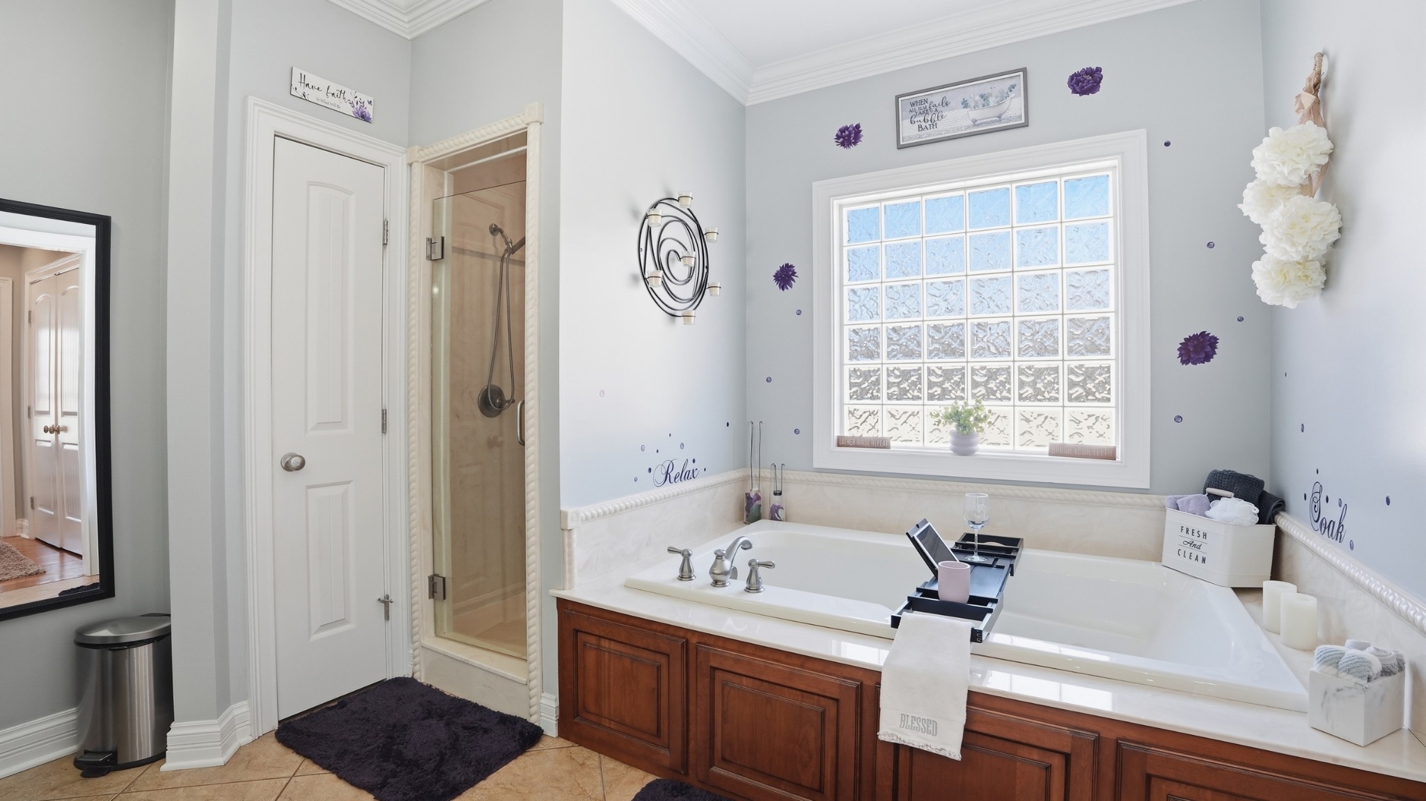 135 Vols Lane Estill Springs, TN 37330 - Photo 17 of 56 a bathroom with a sink vanity granite tub and shower