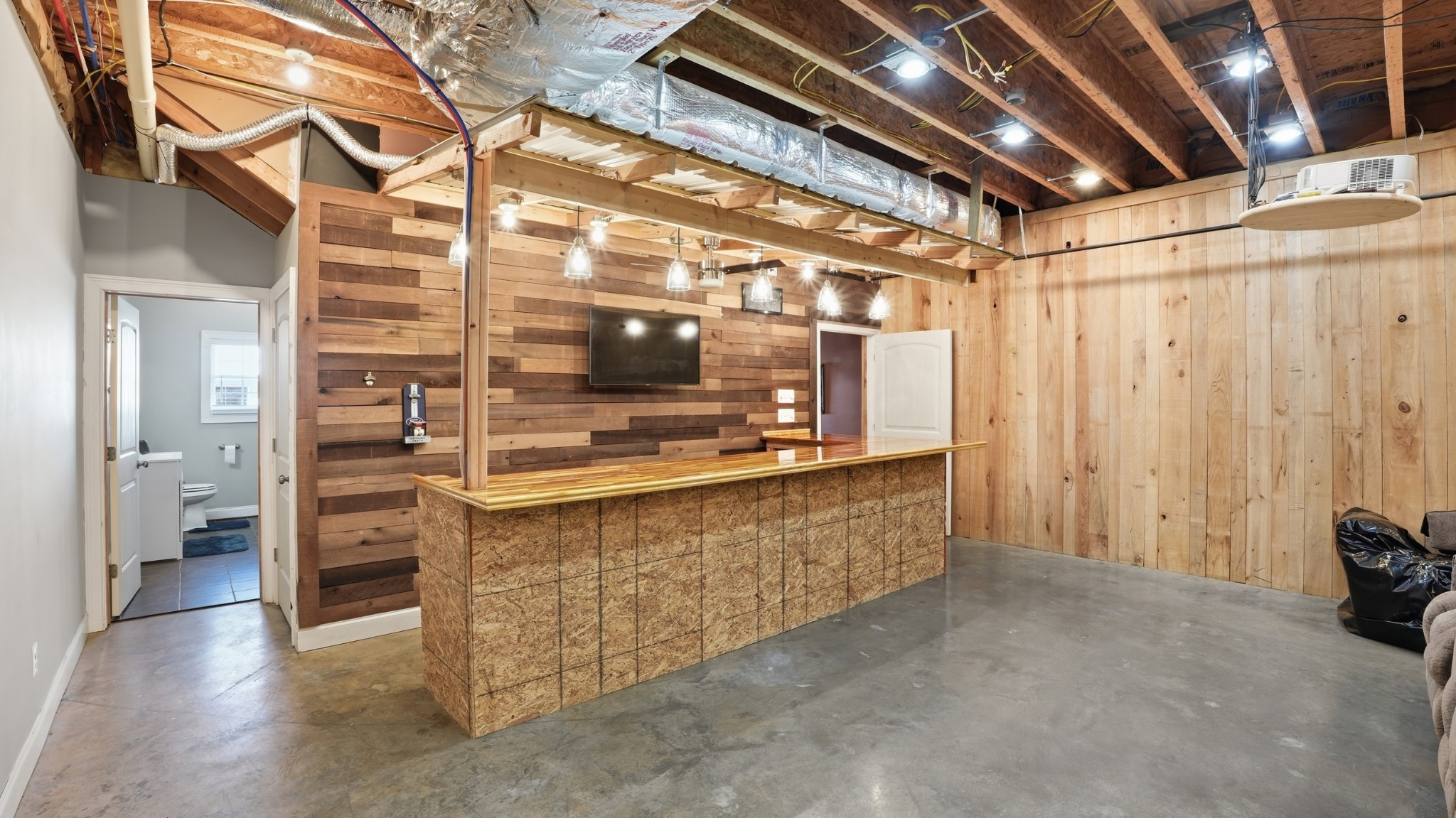 135 Vols Lane Estill Springs, TN 37330 - Photo 26 of 56 a view of a storage & utility room