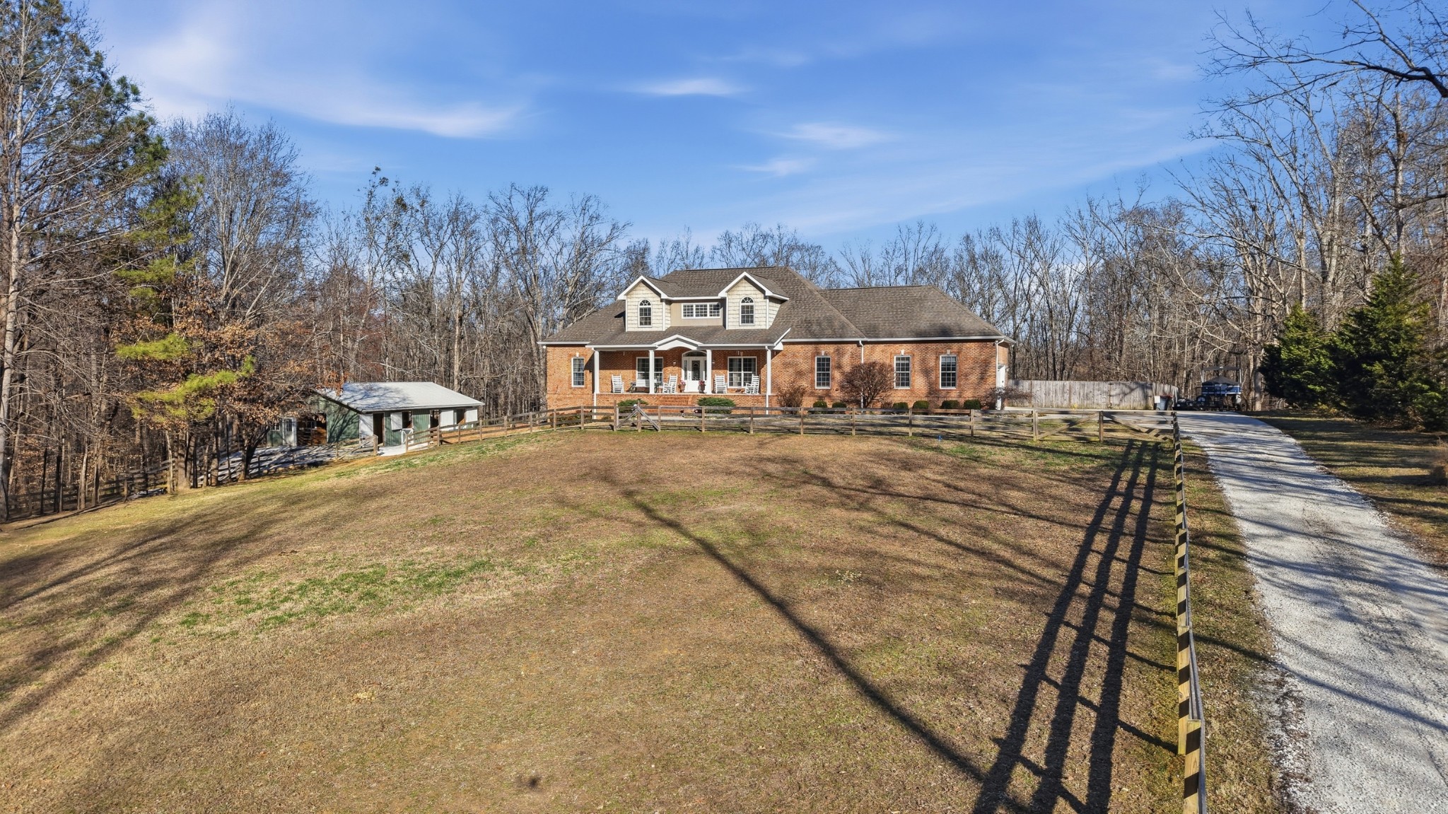 135 Vols Lane Estill Springs, TN 37330 - Photo 3 of 56 a view of a town with large trees