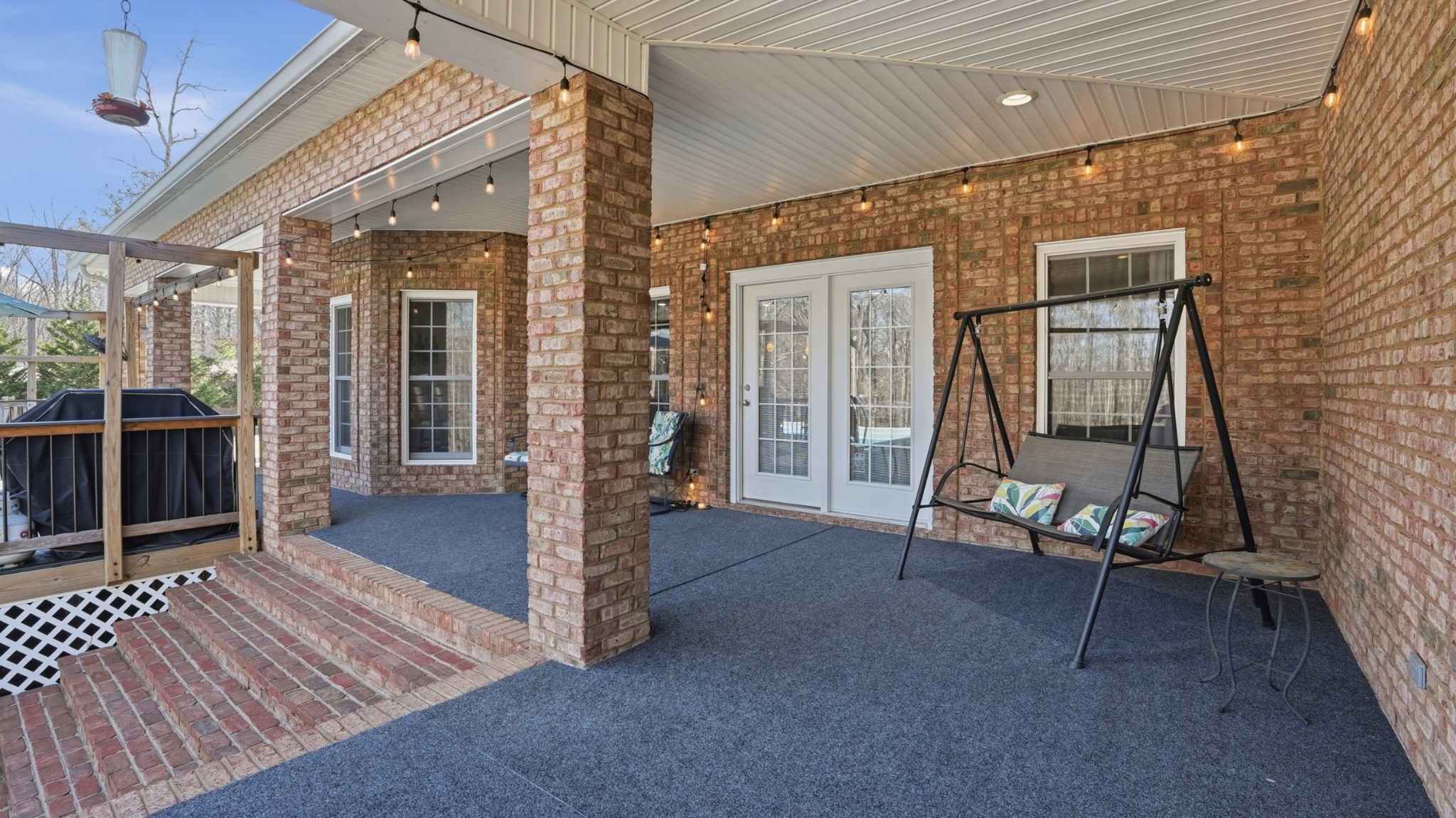 135 Vols Lane Estill Springs, TN 37330 - Photo 33 of 56 a view of an outdoor space with porch and wooden floor