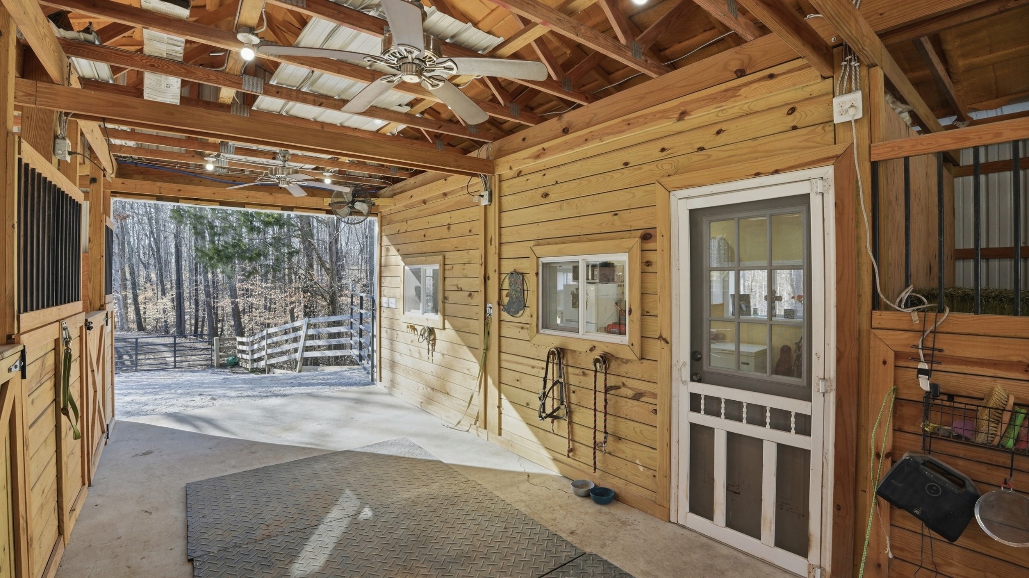 135 Vols Lane Estill Springs, TN 37330 - Photo 42 of 56 a view of a porch with a table and chairs