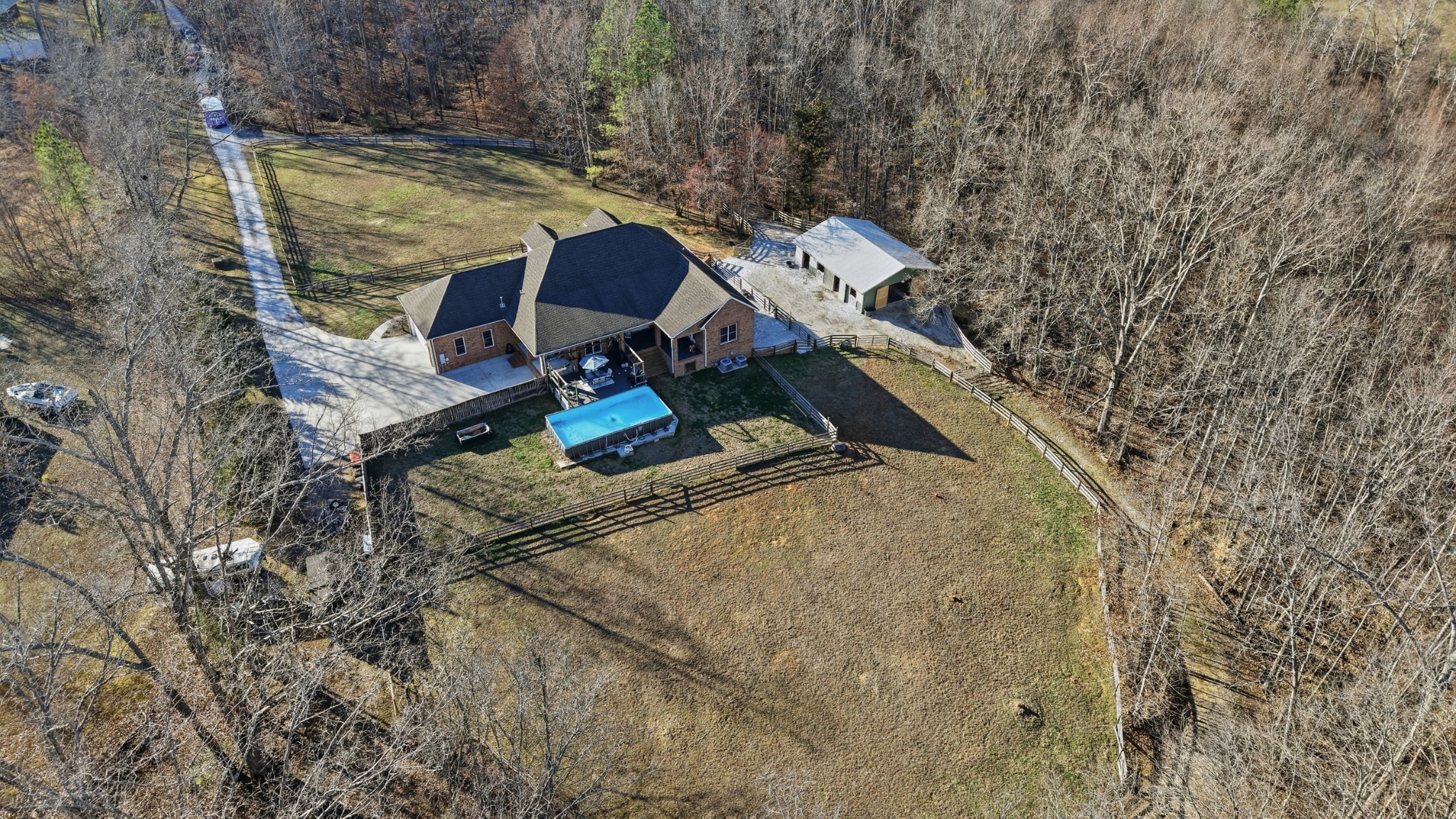 135 Vols Lane Estill Springs, TN 37330 - Photo 48 of 56 a view of balcony with wooden floor and outdoor seating