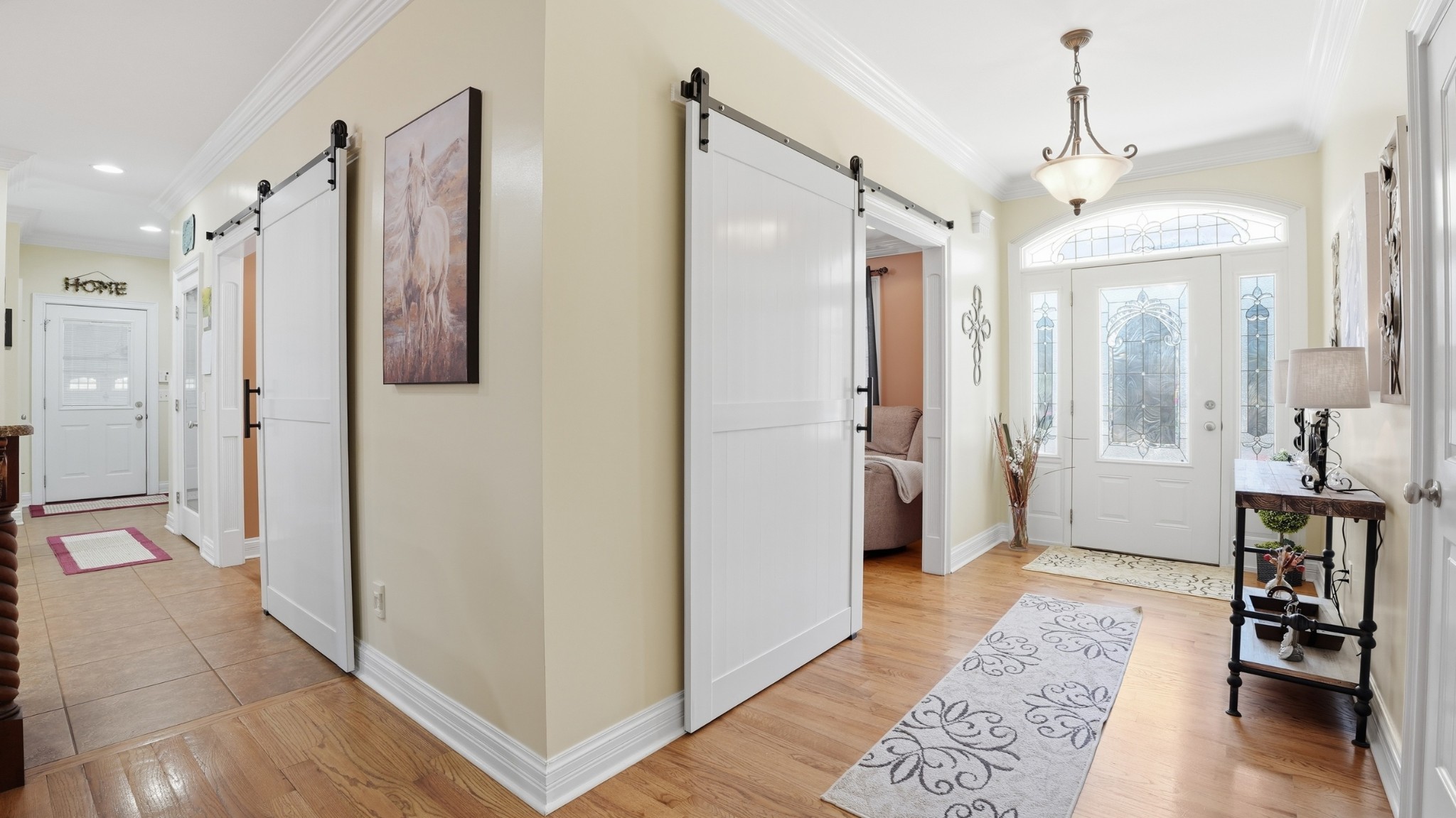 135 Vols Lane Estill Springs, TN 37330 - Photo 8 of 56 a view of a hallway with wooden floor and a bathroom