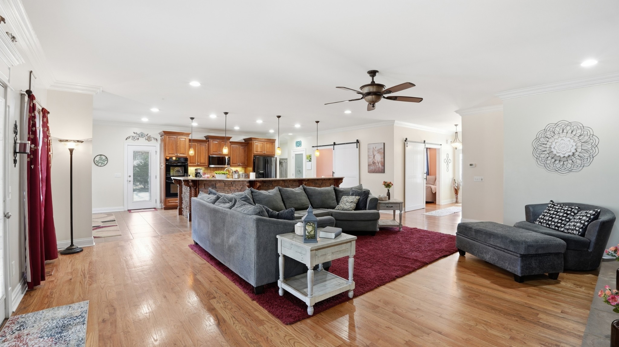 135 Vols Lane Estill Springs, TN 37330 - Photo 10 of 56 a living room with furniture and a chandelier