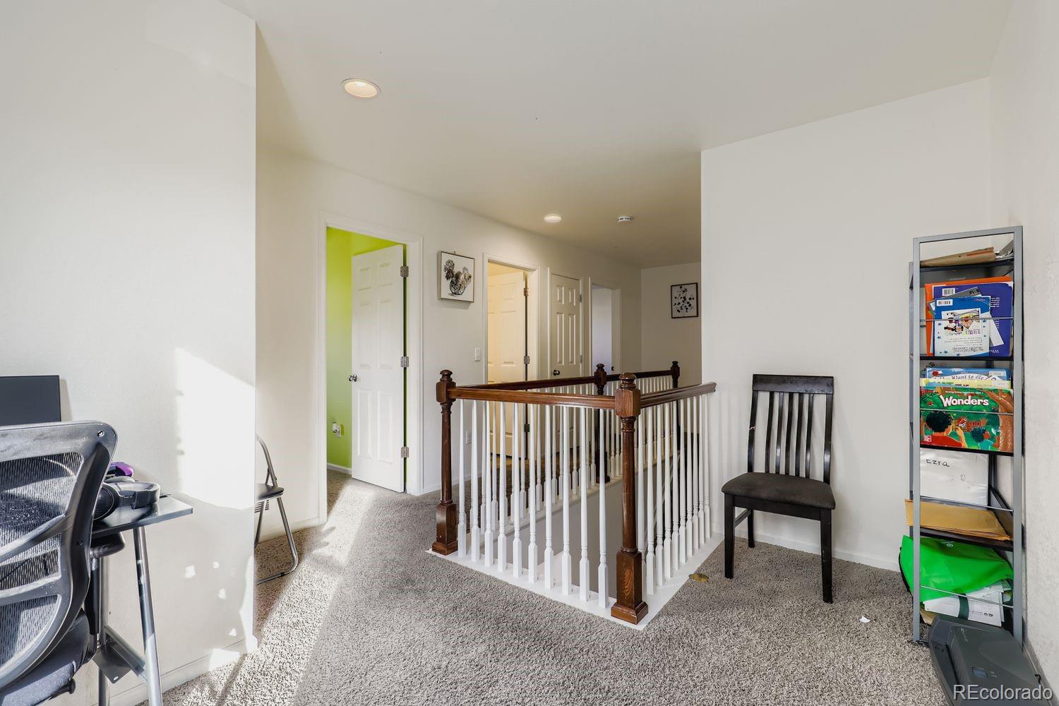 5545 Liverpool Street Denver, CO 80249 - Photo 23 of 28 a view of entryway with livingroom