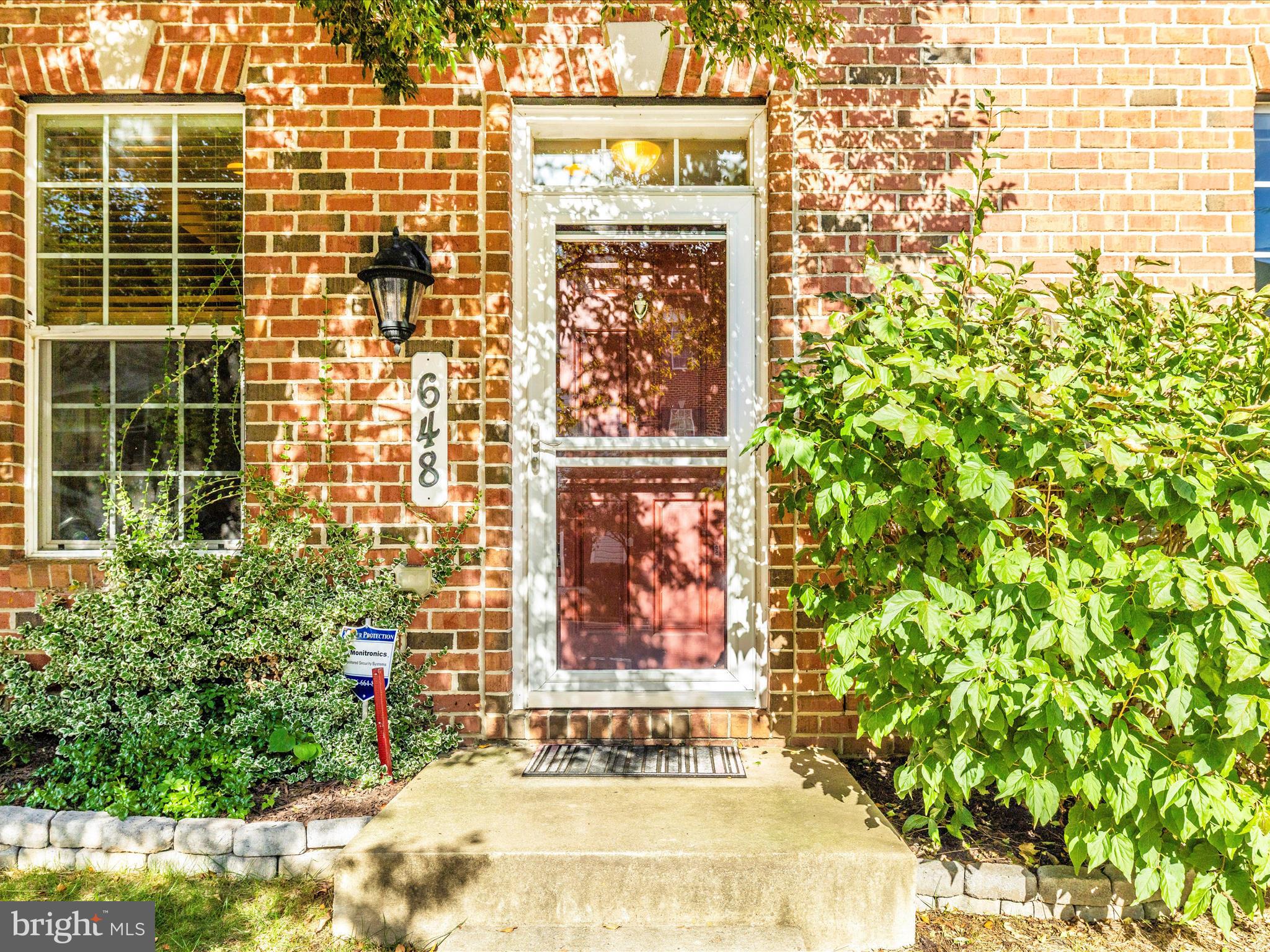648 Tivoli Road Frederick, MD 21703 - Photo 1 of 51 a view of a door and tree