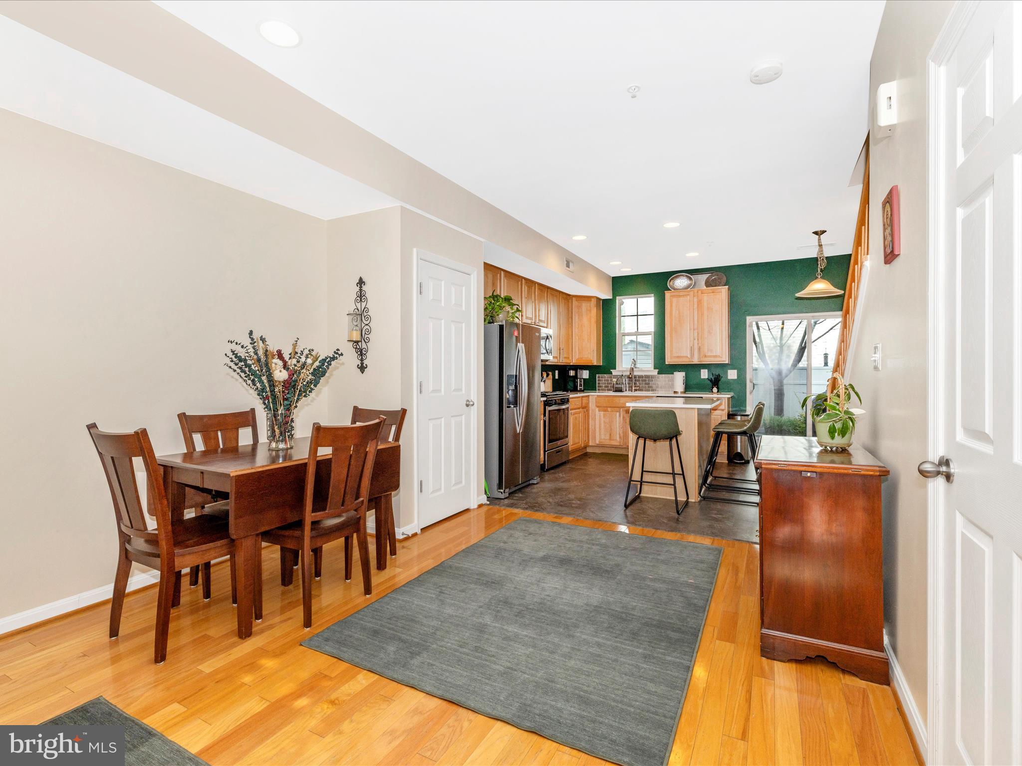 648 Tivoli Road Frederick, MD 21703 - Photo 11 of 51 a view of a dining room with furniture window and wooden floor