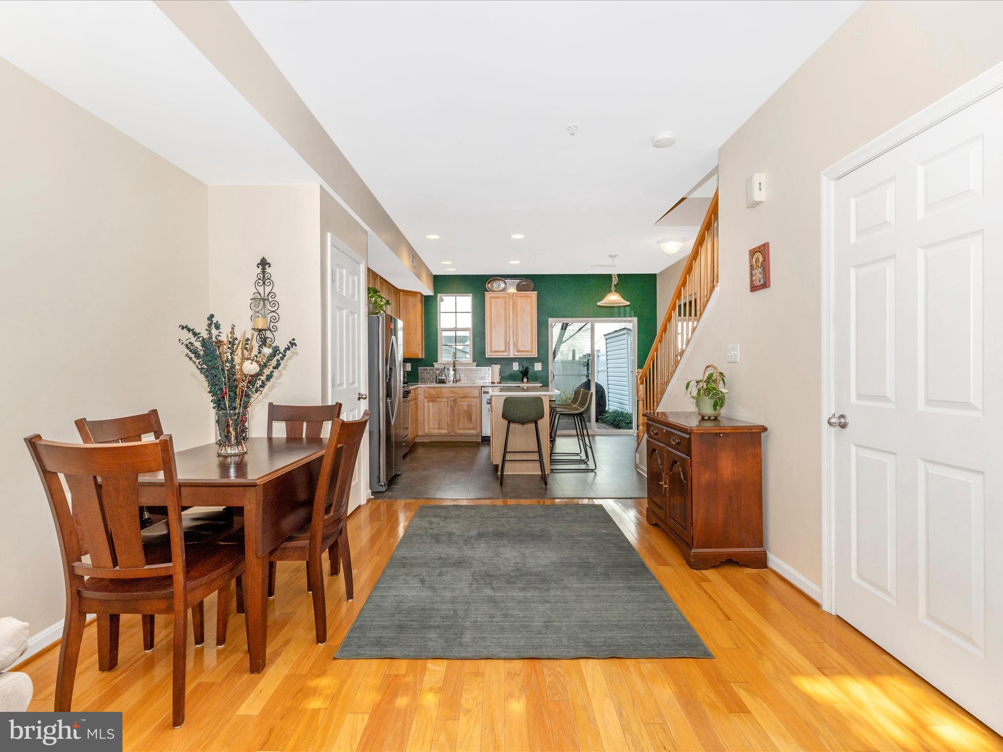 648 Tivoli Road Frederick, MD 21703 - Photo 12 of 51 a view of a dining room with furniture and wooden floor