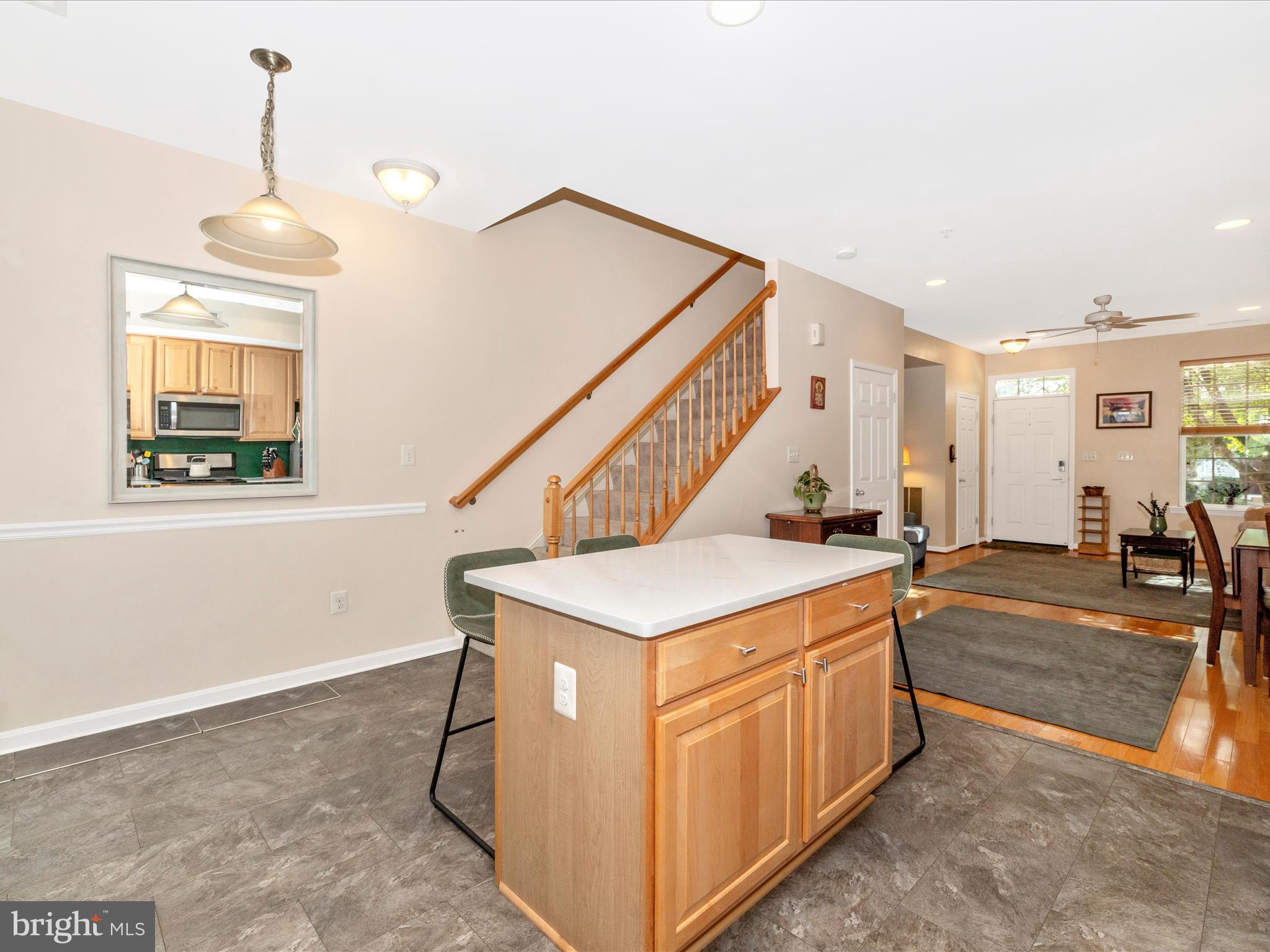 648 Tivoli Road Frederick, MD 21703 - Photo 17 of 51 a view of a livingroom with furniture stairs and windows