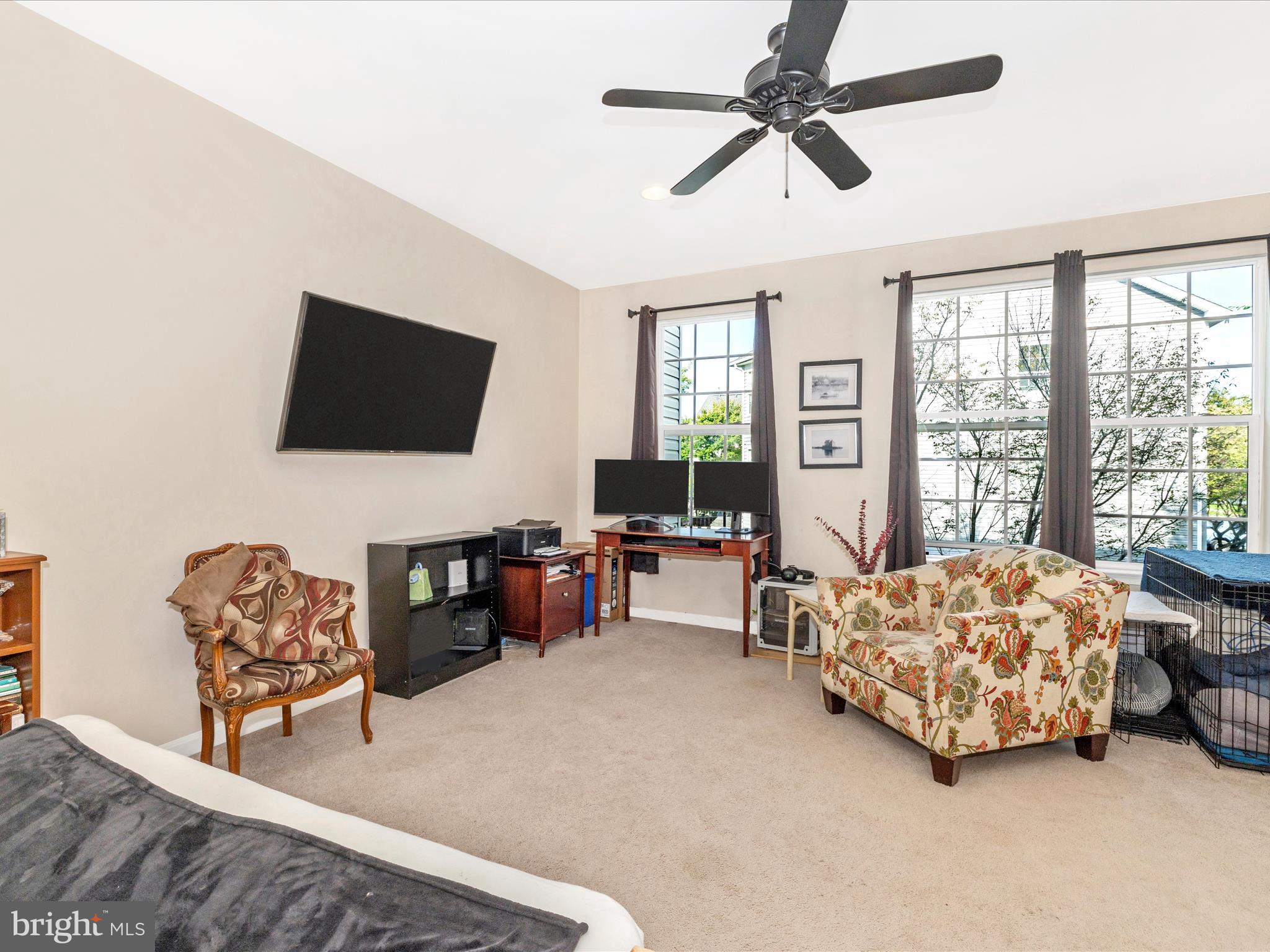 648 Tivoli Road Frederick, MD 21703 - Photo 20 of 51 a living room with furniture and a flat screen tv