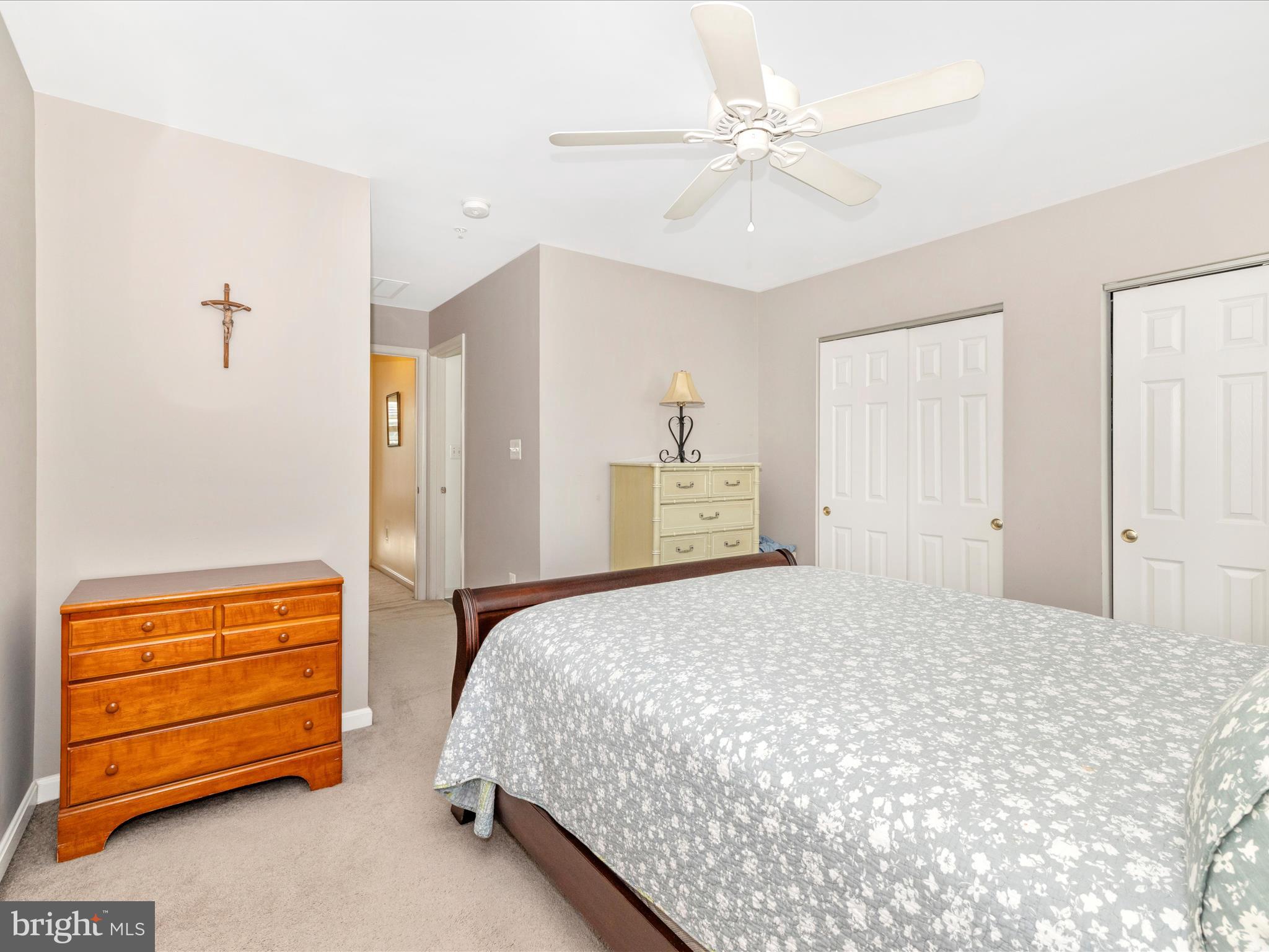648 Tivoli Road Frederick, MD 21703 - Photo 26 of 51 a bedroom with a bed and a chandelier