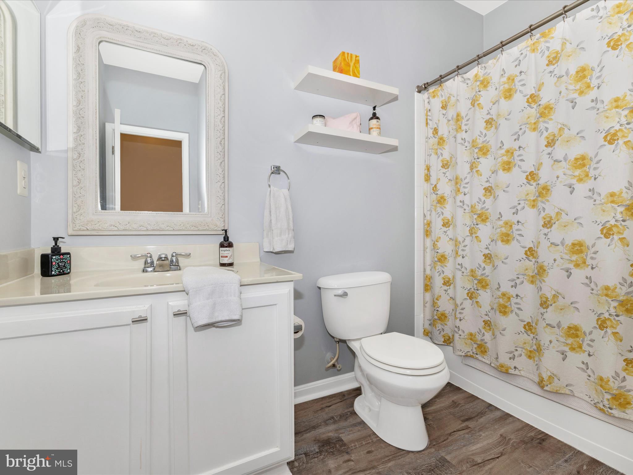648 Tivoli Road Frederick, MD 21703 - Photo 34 of 51 a bathroom with a toilet and a sink
