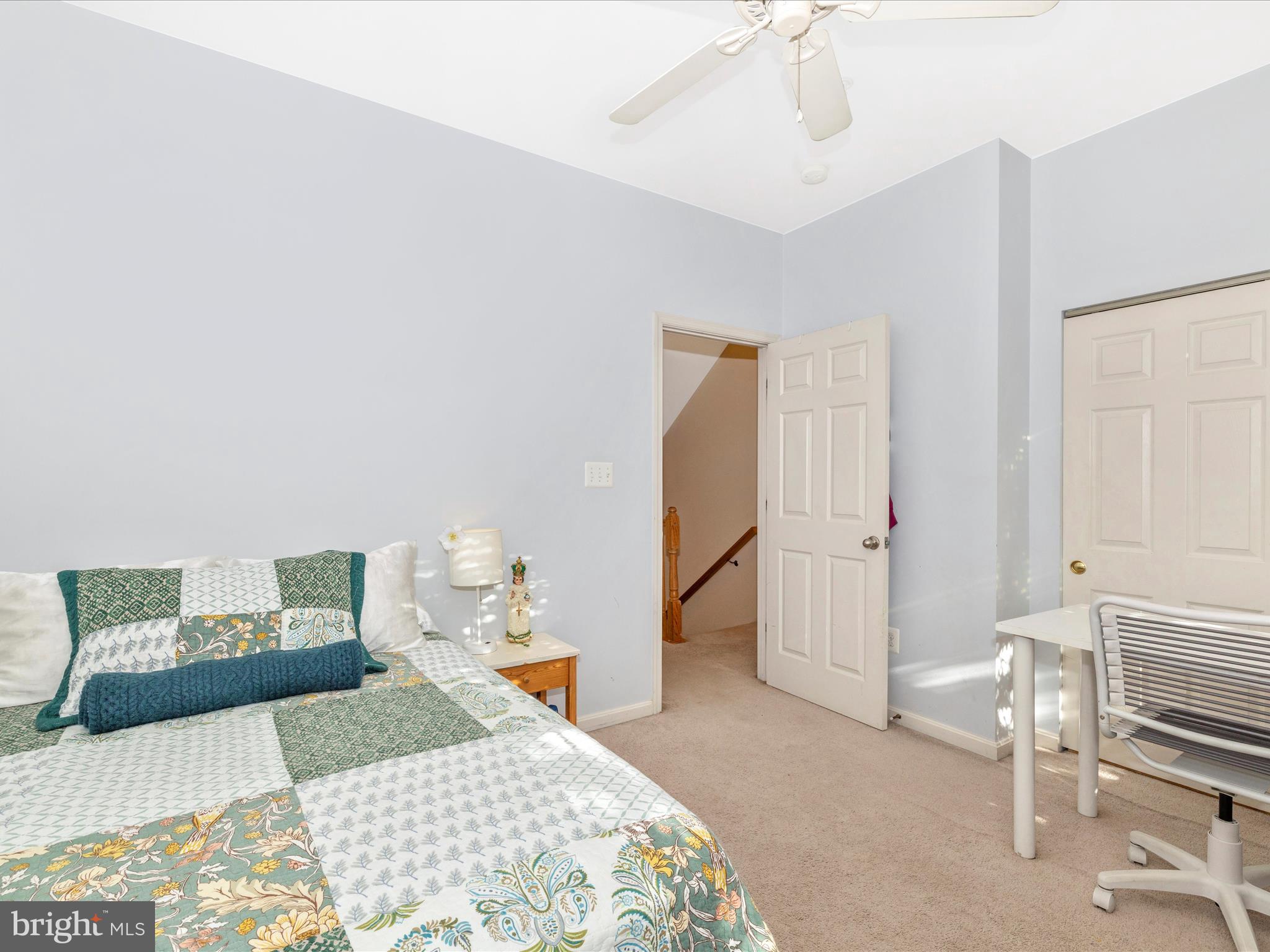 648 Tivoli Road Frederick, MD 21703 - Photo 37 of 51 a bedroom with a bed and a chandelier