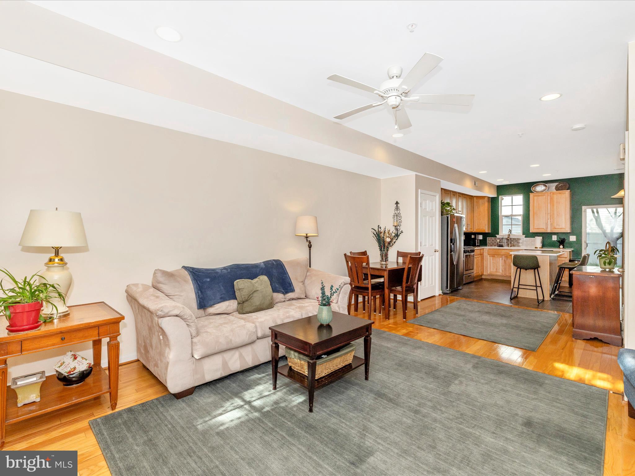 648 Tivoli Road Frederick, MD 21703 - Photo 7 of 51 a living room with furniture and a wooden floor