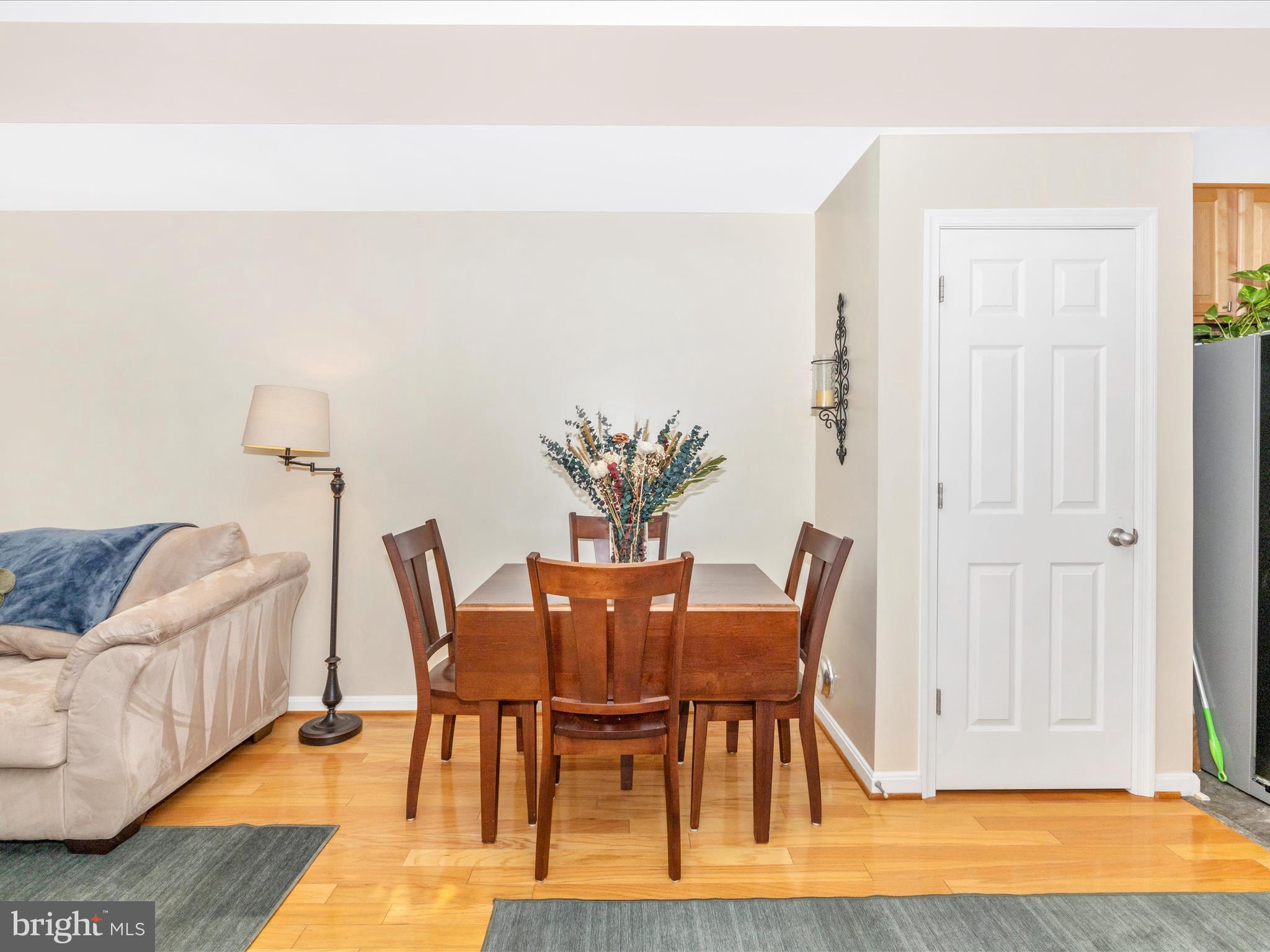 648 Tivoli Road Frederick, MD 21703 - Photo 10 of 51 a view of a livingroom with furniture and wooden floor