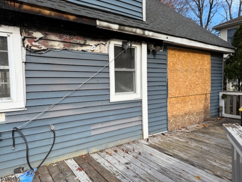 43 Madison Street Pequannock, NJ 07440 - Photo 3 of 16 a view of a balcony with a door