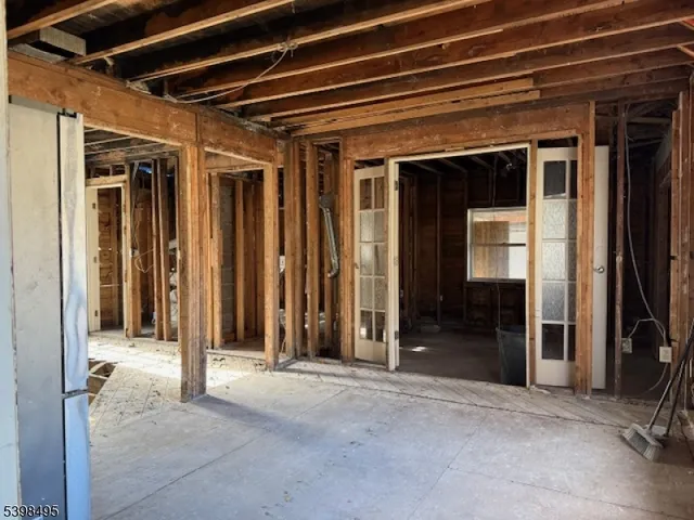 a view of a room with wooden walls