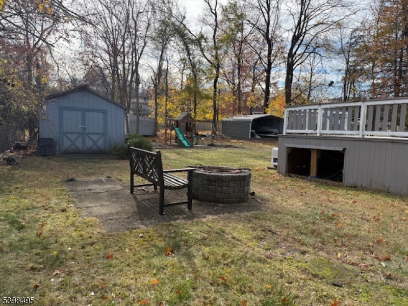43 Madison Street Pequannock, NJ 07440 - Photo 9 of 16 a front view of a house with garden