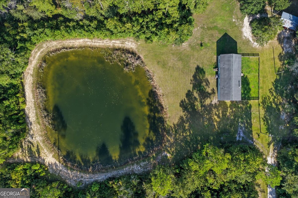 2273 Ga Highway 110 Folkston, GA 31537 - Photo 11 of 42 an aerial view of a house with a yard and trees all around