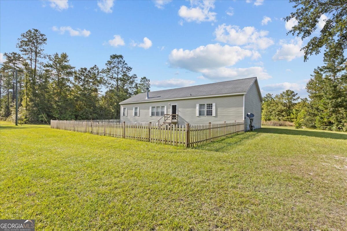 2273 Ga Highway 110 Folkston, GA 31537 - Photo 3 of 42 a view of house with outdoor space and swimming pool