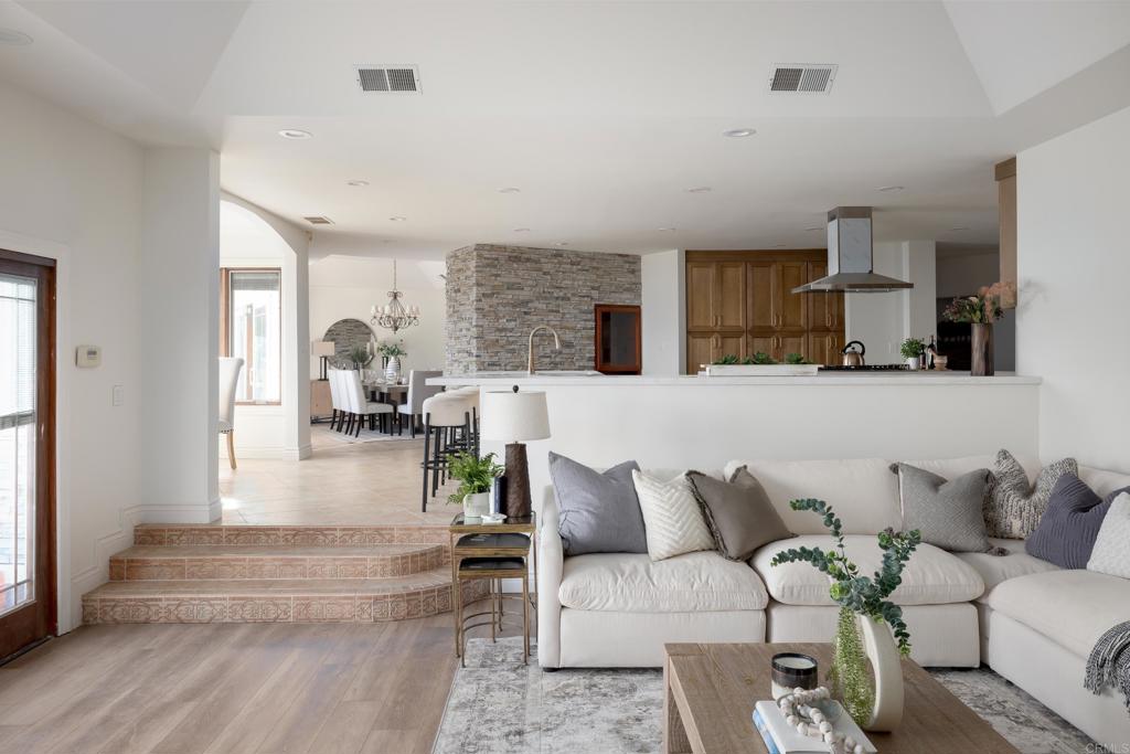 15017 Skyridge Road Poway, CA 92064 - Photo 12 of 54 a living room with furniture and a couch