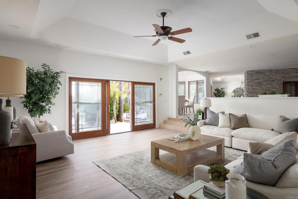 15017 Skyridge Road Poway, CA 92064 - Photo 13 of 54 a living room with furniture and a large window