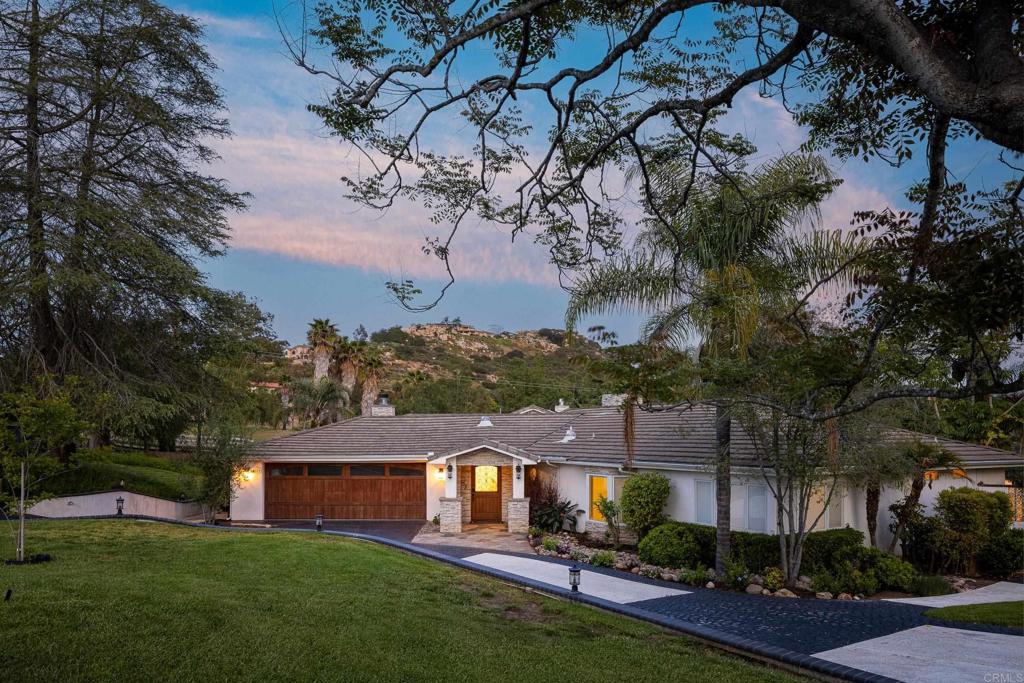 15017 Skyridge Road Poway, CA 92064 - Photo 2 of 54 an aerial view of house with yard and green space
